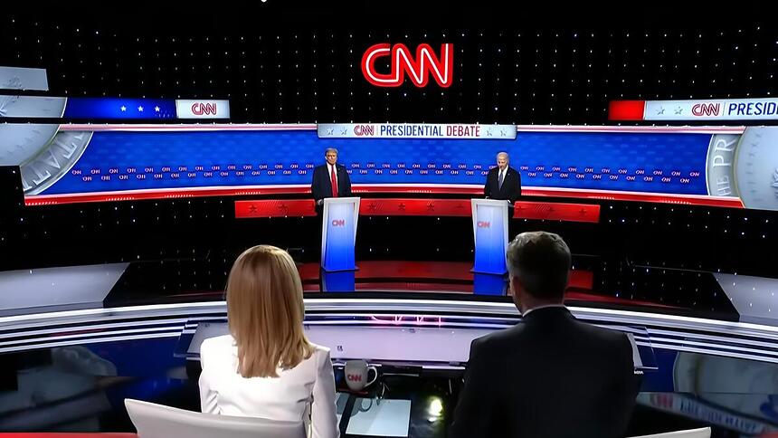 Donald Trump e Joe Biden no centro do cenário do Debate da CNN