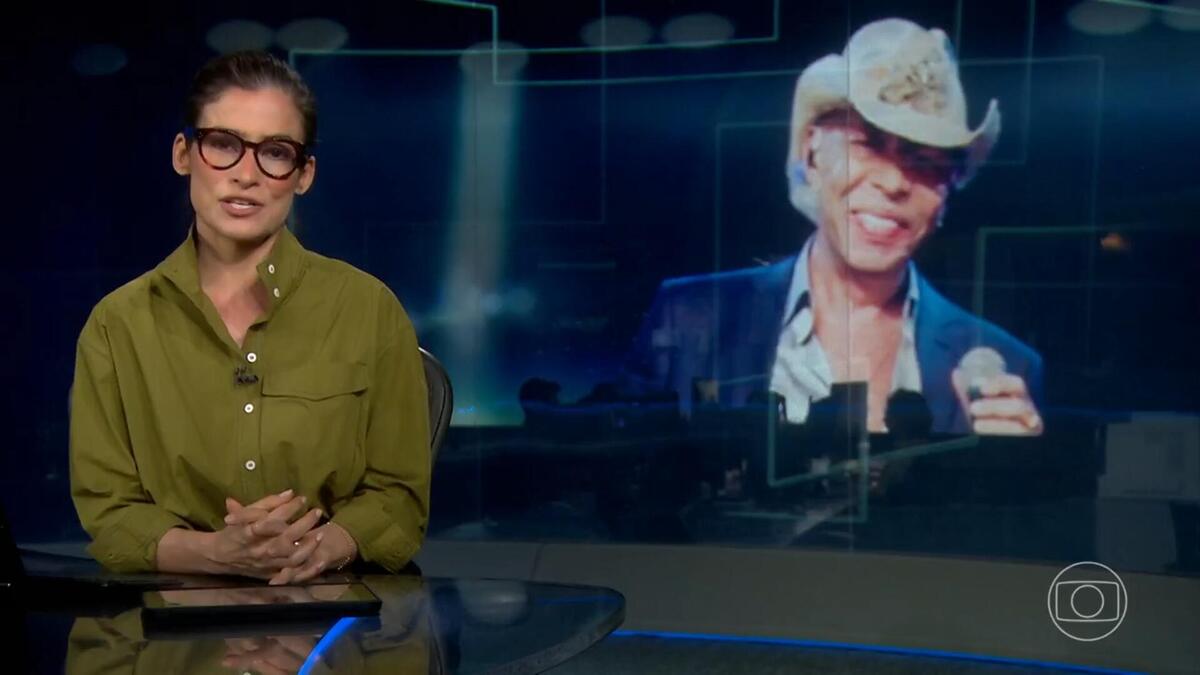 Renata Vasconcellos noticiando a morte de Chrystian no Jornal Nacional