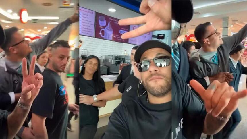 Neymar causando um alvoroço de fãs em um shopping de São Vicente