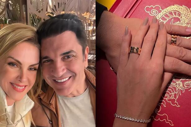 Ana Hickmann e Edu Guedes sorrindo ao lado do par de alianças nas mãos