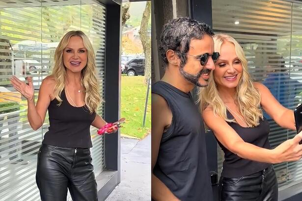 Eliana chega na entrada da TV Globo, acena e tira foto ao lado de fã