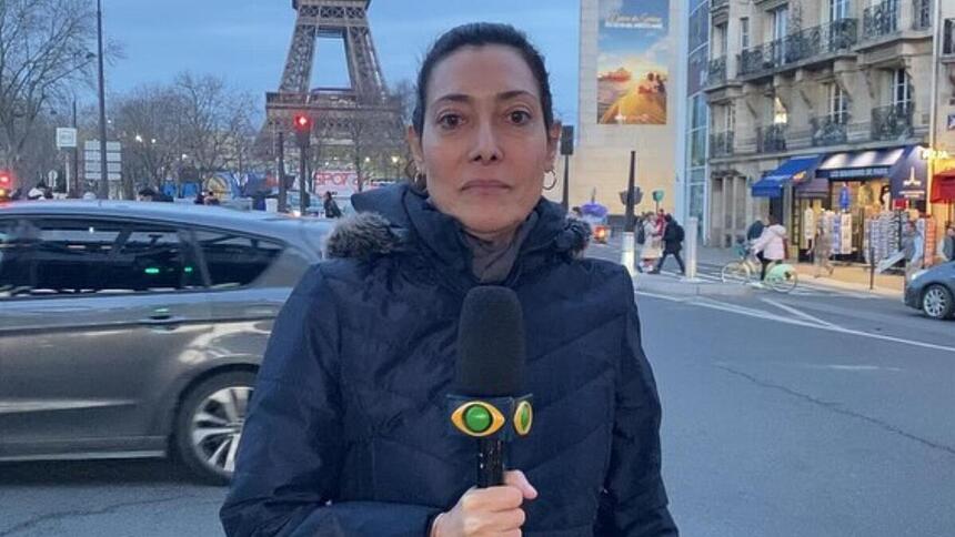 Repórter Sonia Blota direto de Paris com o microfone da Band