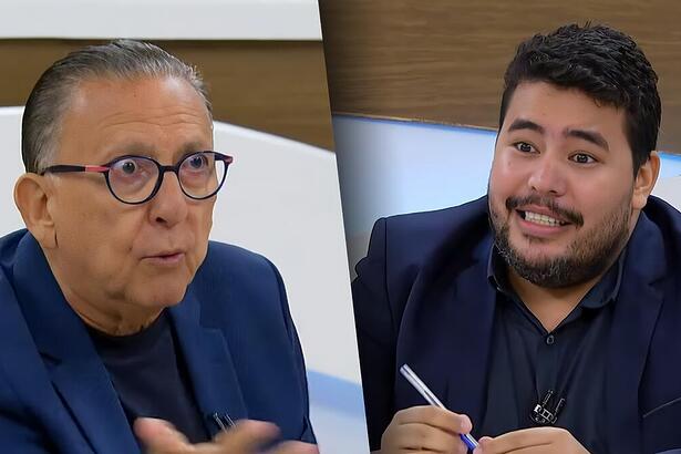 Galvão Bueno com os olhos arregalados, debatendo com o jornalista Gabriel Vaquer no Roda Viva