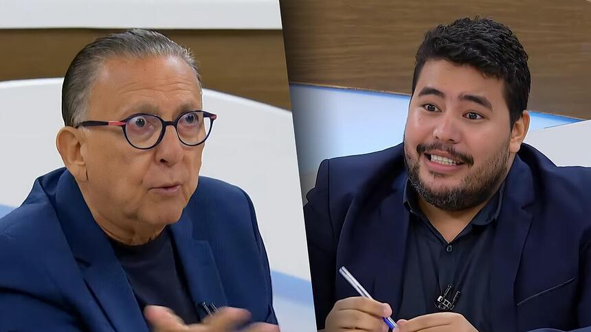 Galvão Bueno com os olhos arregalados, debatendo com o jornalista Gabriel Vaquer no Roda Viva