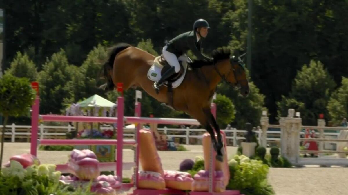 Pedro Veniss e o seu cavalo na prova de hipismo da Olimpíada