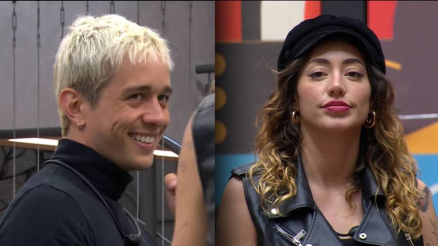 Matheus sorrindo na cozinha do Estrela da Casa em Montagem com Nicole que está séria