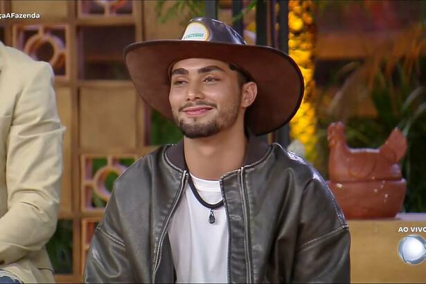 Gui sorrindo ao indicar Juninho para a Roça de A Fazenda