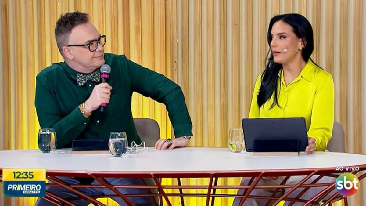Felipeh Campos e Márcia Dantas sendo na bancadas do Primeiro Impacto