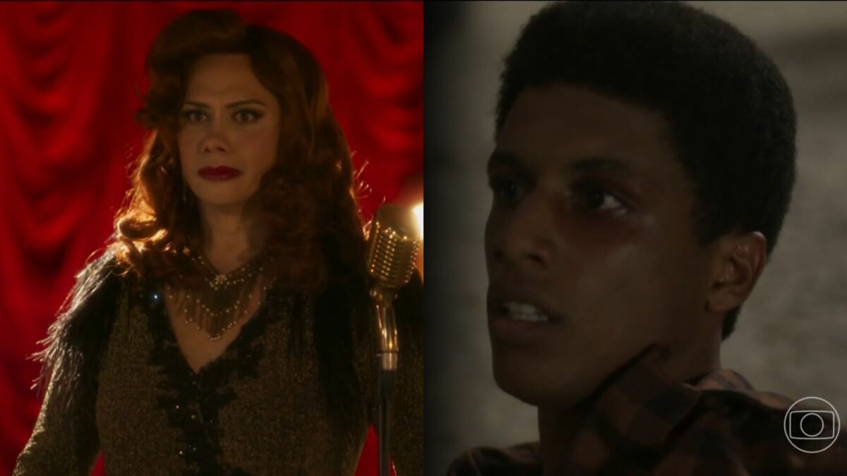 Érico vestido como Veronica Queen assustado ao ver Carlito que também está assustado jogado no chão de uma rua em cena de Garota do Momento