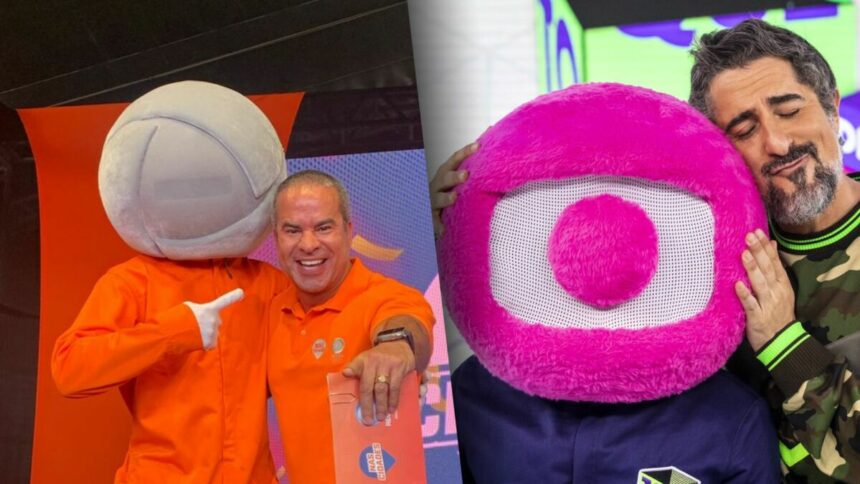 Fred Linhares ao lado do mascote da RECORD com o logo cinza e roupa laranja dividindo tela com MArcos Mion abraçado ao Globolinho, mascote da Globo