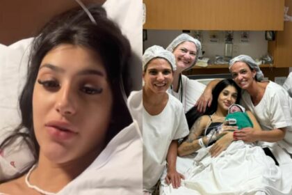 Bia Miranda no hospital, ao lado da equipe médica e com a bebê Maysha no colo
