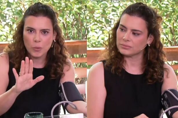 Michelle Loreto com o aparelho de aferir pressão no braço, em trecho do Bem Estar no É de Casa