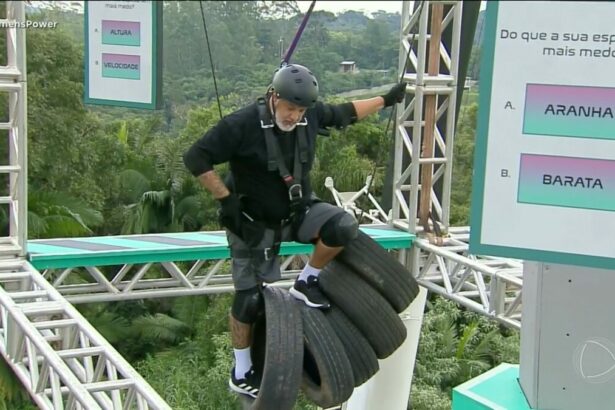 André em cima de uns pneus na Prova dos Homens do Power Couple Brasil 7