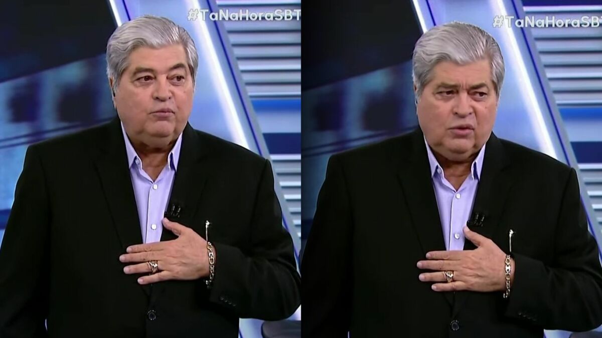 Datena usa terno preto e camisa clara lilá no cenário do Tá na Hora no SBT