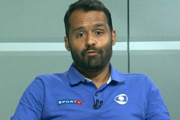 Conrado Santana com o uniforma da equipe de esportes da Globo
