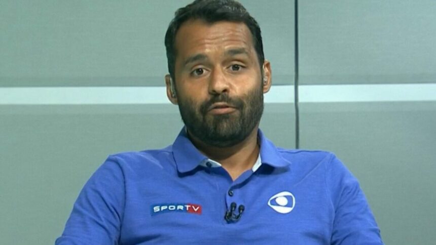 Conrado Santana com o uniforma da equipe de esportes da Globo