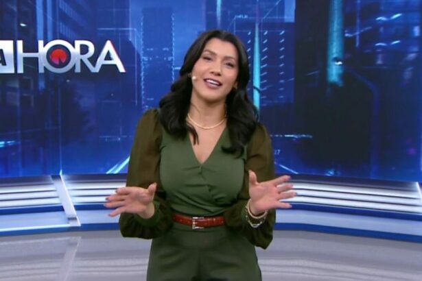 Daniele Brandi gesticulando com os braços, em trecho de edição do Tá na Hora