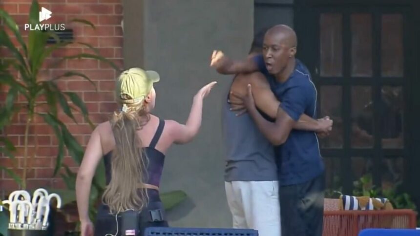 Everton, sendo segurado por Dhomini, e Rayanne em trecho de uma treta no Power Couple