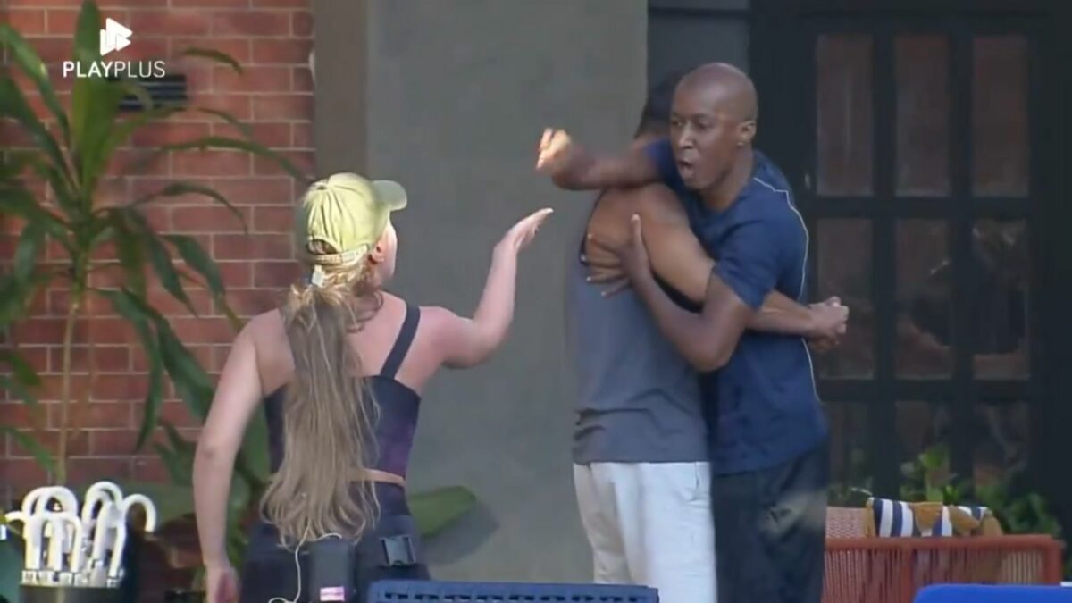 Everton, sendo segurado por Dhomini, e Rayanne em trecho de uma treta no Power Couple