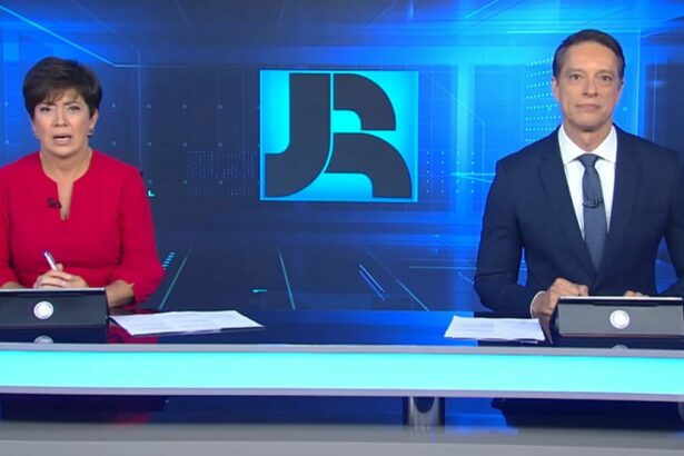 Sergio Aguiar e Christina Lemos na banca do Jornal da Record