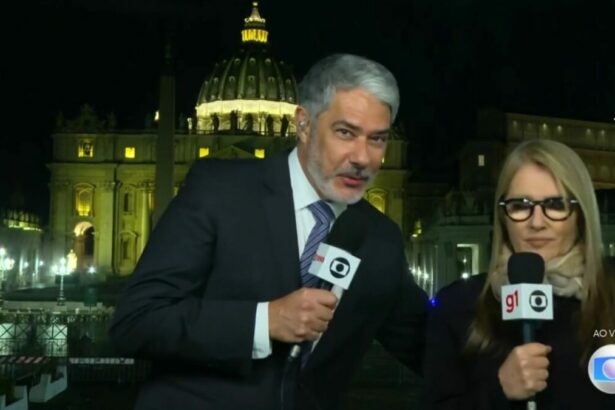 William Bonner tentando dar um abraço em Ilze Scamparini ao vivo no Jornal Nacional