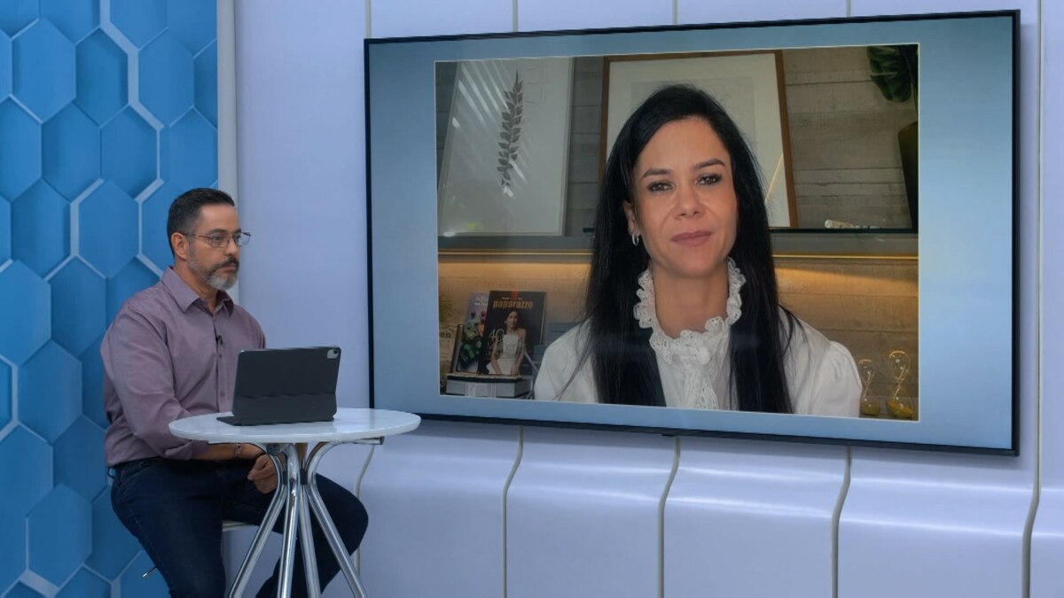 Eduardo Miranda conversa com uma nutricionista pelo telão do Aparecida Debate