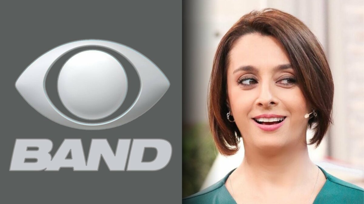 Logo da Band ao lado de Catia Fonseca que está de blusa verde e olhando para o lado, em pé, no cenário do Bom Dia & CIA