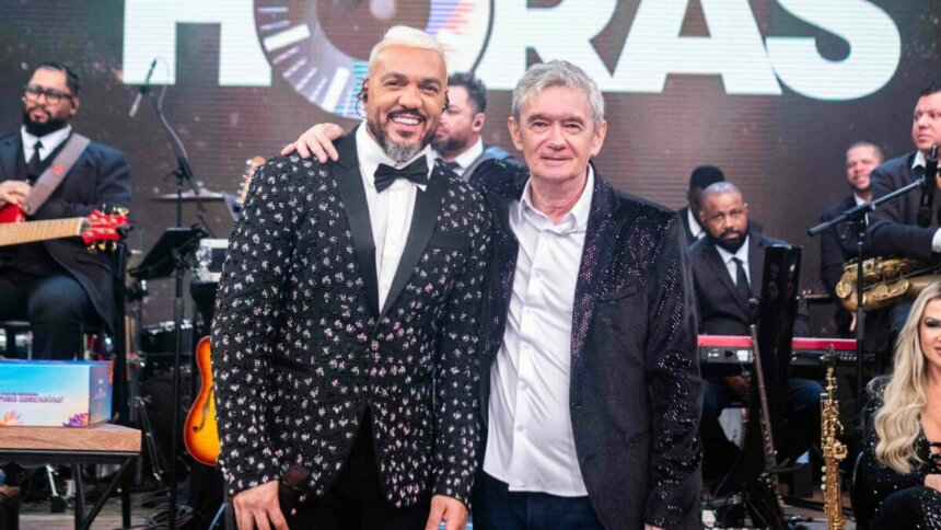 Belo e Serginho Groisman em foto posada no estúdio do Altas Horas