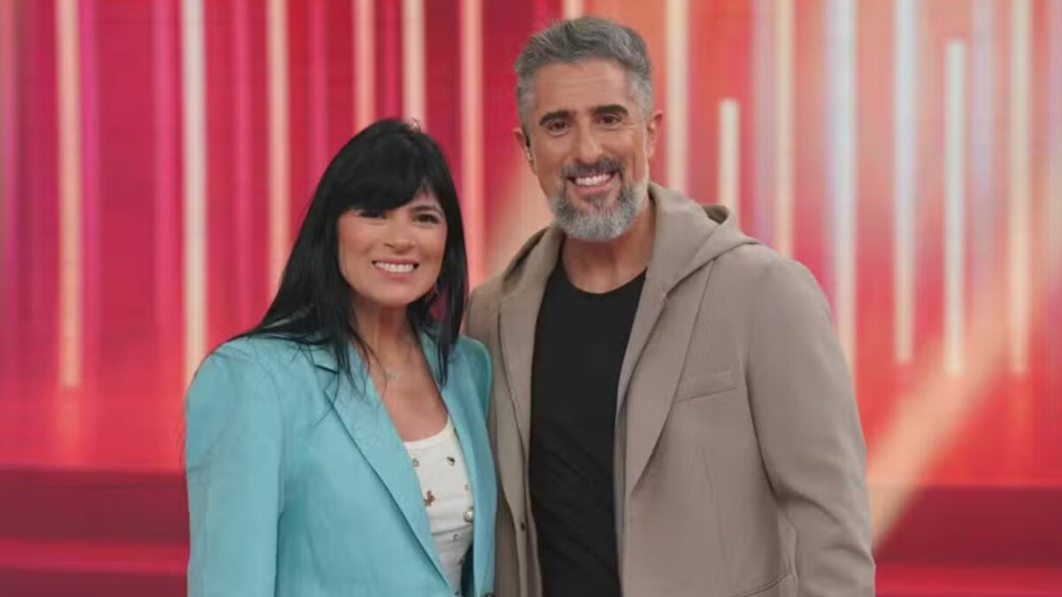 Fernanda Brum e Marcos Mion em foto posada no cenário do Caldeirão