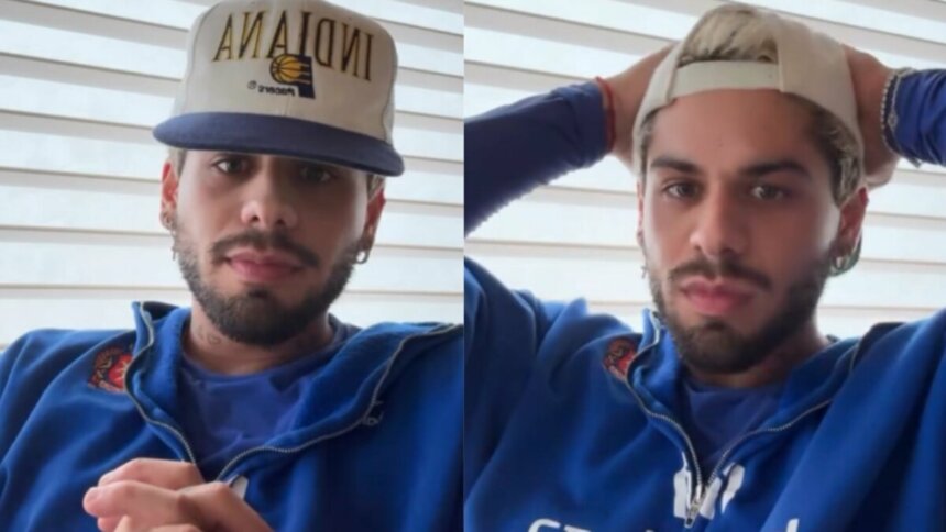 Zé Felipe em trechos do storie de agasalho azul e boné