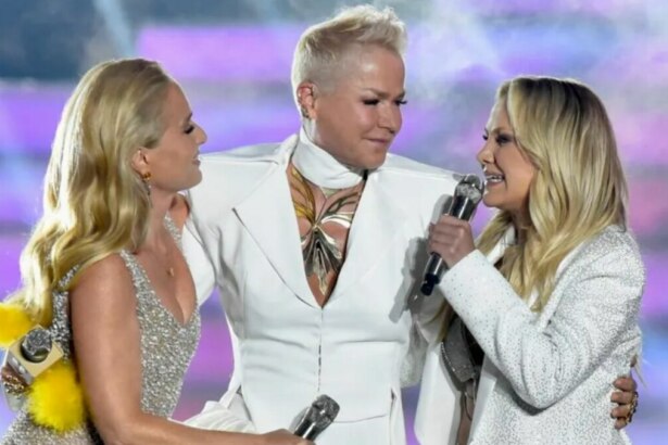 Angélica, Xuxa e Eliana juntas e sorrindo, em trecho da apresentação no Criança Esperança no ano de 2023