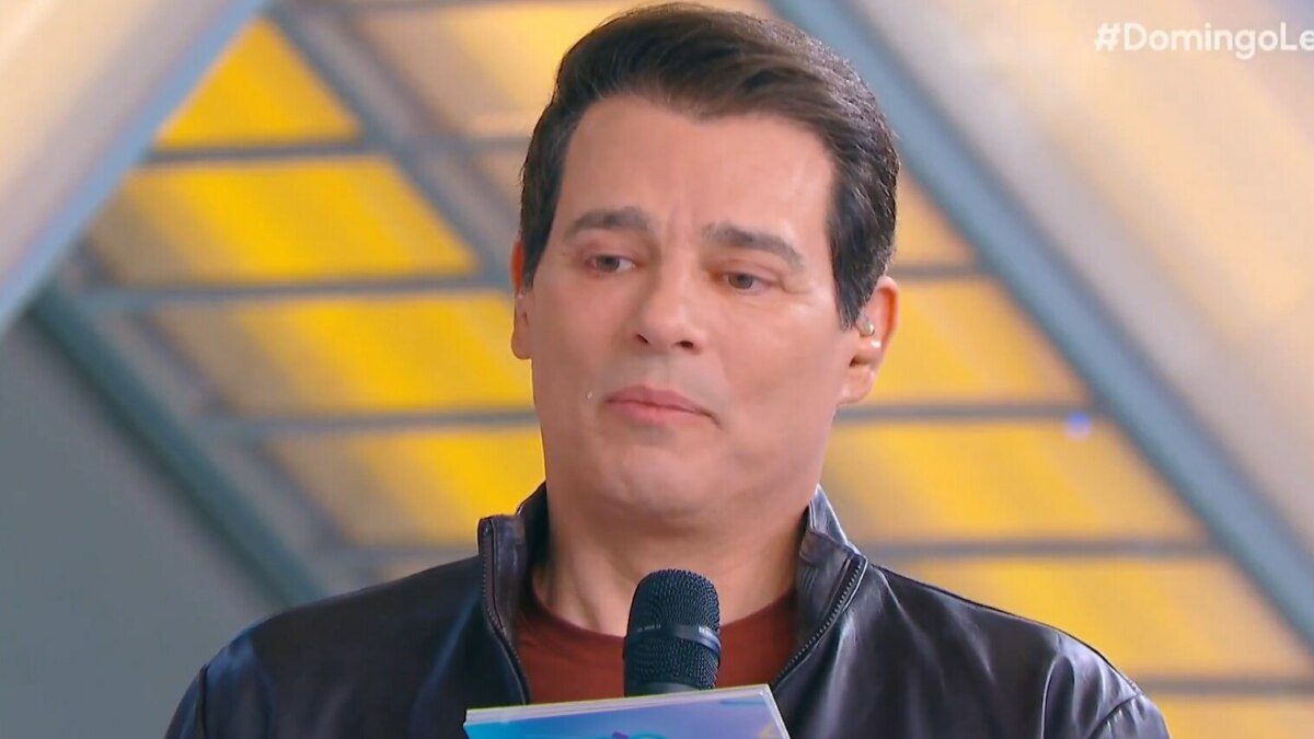 Celso Portiolli chorando no Domingo Legal ao relembrar a morte do irmão