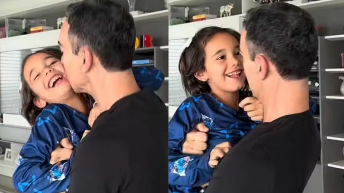Cesar Trali, abraçando e beijando a filha Manuella, na celebração do aniversário de 6 anos