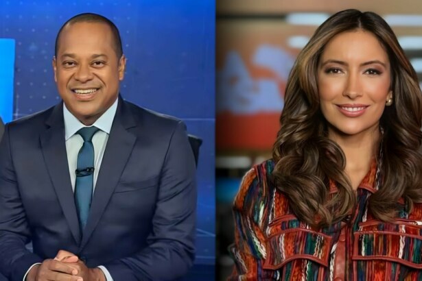 Luiz Fara Monteiro sentado na bancada do Jornal da Record, dividindo tela com Paloma Poeta no cenário do Fala Brasil. Ambos estão sorridentes