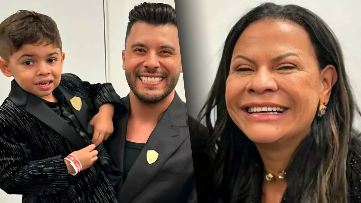Murilo Huff segura o filho Léo nos braços. Ao lado está a m]ae de Marília Mendonça, Ruth, Sorridente.