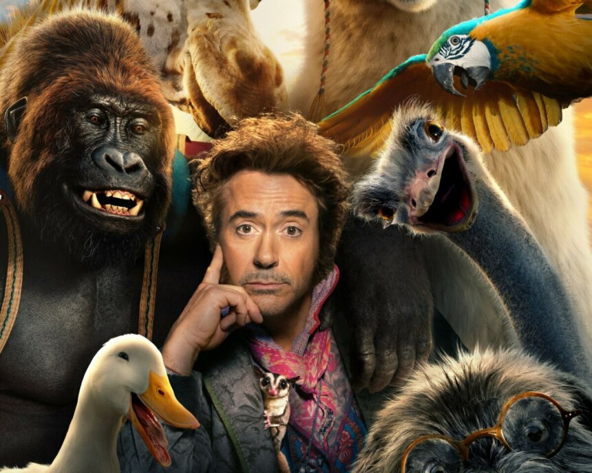 Robert Downey Jr. cercado por animais no pôster do filme Dolittle