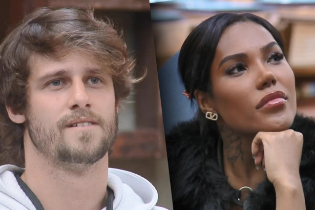 Matheus e Carol olhando para o telão de A Fazenda 17